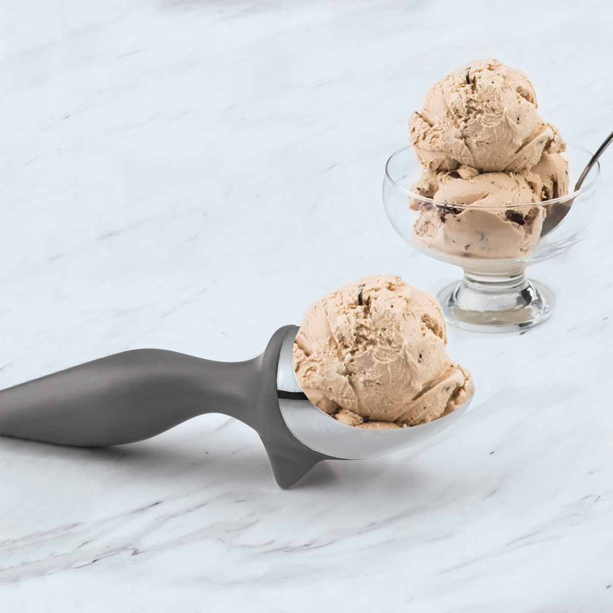 https://www.containerstore.com/catalogimages/424407/10086195-Tovolo-Ice-Cream-Scoop-VEN2.jpg